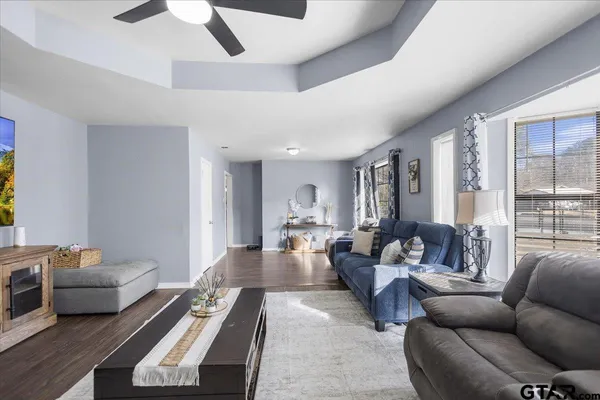 a living room with furniture and a large window