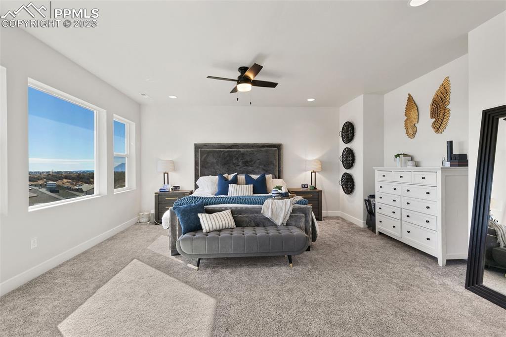 2375 Merlot Drive Colorado Springs, CO 80921 - Photo 25 of 49 a living room with furniture and a large window