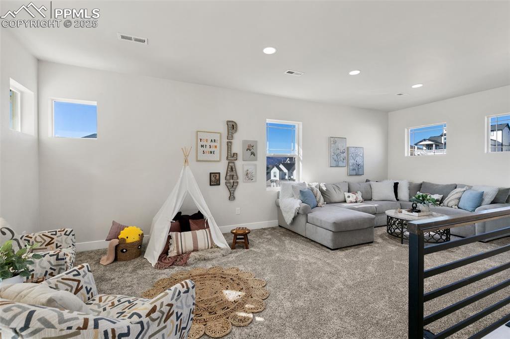 2375 Merlot Drive Colorado Springs, CO 80921 - Photo 6 of 49 a living room with furniture and mountain view