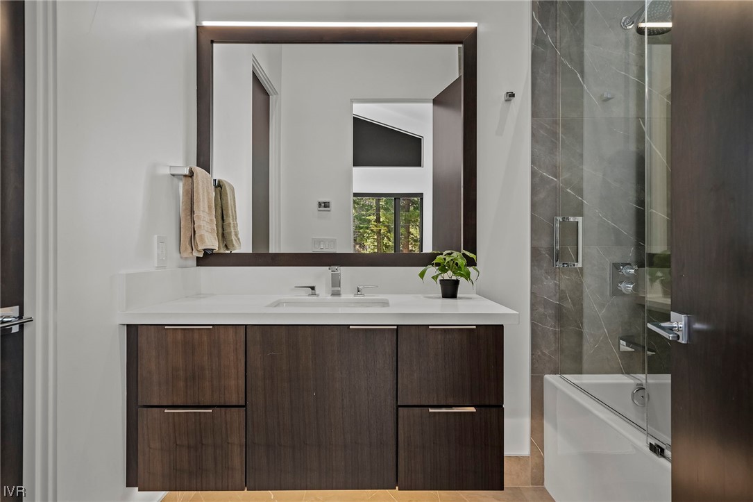 199 Tramway Road Incline Village, NV 89451 - Photo 19 of 49 a bathroom with a sink a toilet and mirror