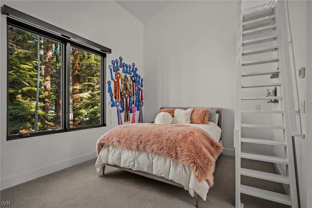 199 Tramway Road Incline Village, NV 89451 - Photo 20 of 49 a bedroom with a large bed and a large window