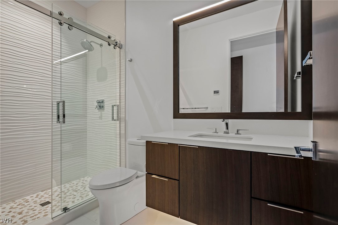 199 Tramway Road Incline Village, NV 89451 - Photo 22 of 49 a bathroom with a toilet sink double vanity and shower