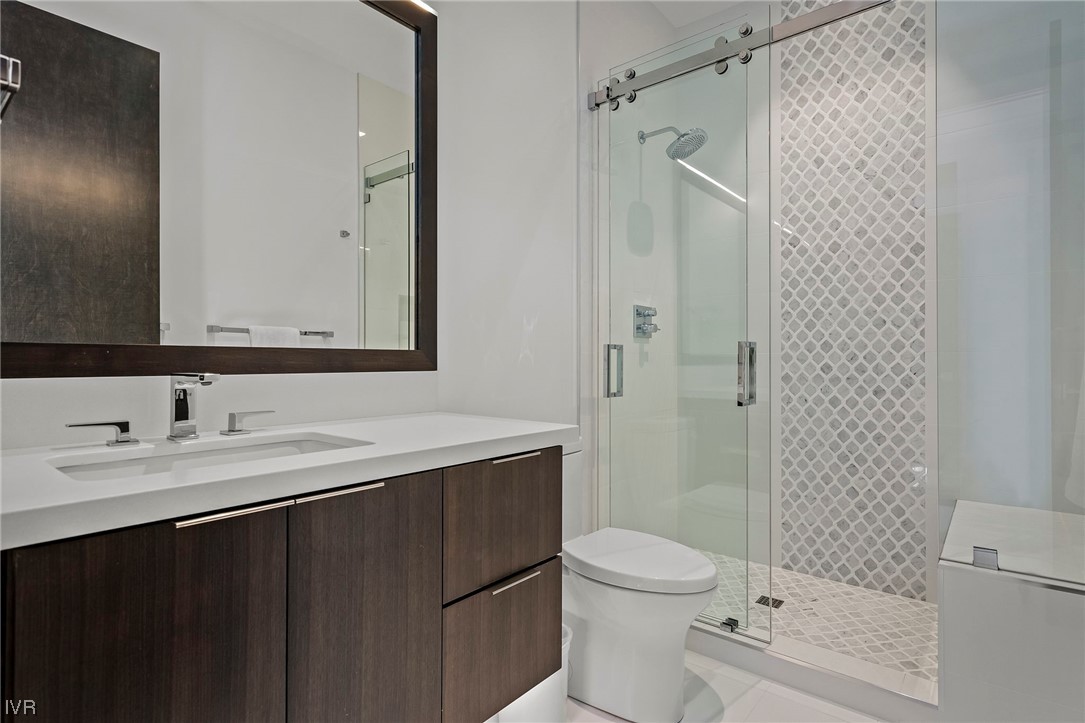 199 Tramway Road Incline Village, NV 89451 - Photo 24 of 49 a bathroom with a sink a toilet and shower
