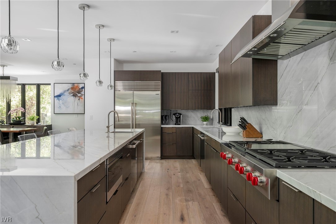 199 Tramway Road Incline Village, NV 89451 - Photo 34 of 49 a kitchen with granite countertop a sink stove and refrigerator