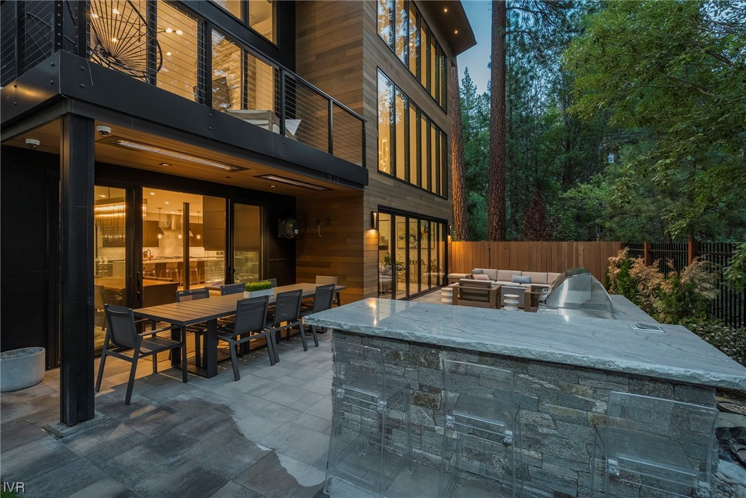 199 Tramway Road Incline Village, NV 89451 - Photo 39 of 49 a view of a patio with table and chairs and potted plants