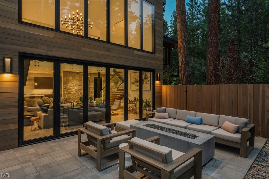 199 Tramway Road Incline Village, NV 89451 - Photo 41 of 49 a backyard of a house with barbeque oven table and chairs