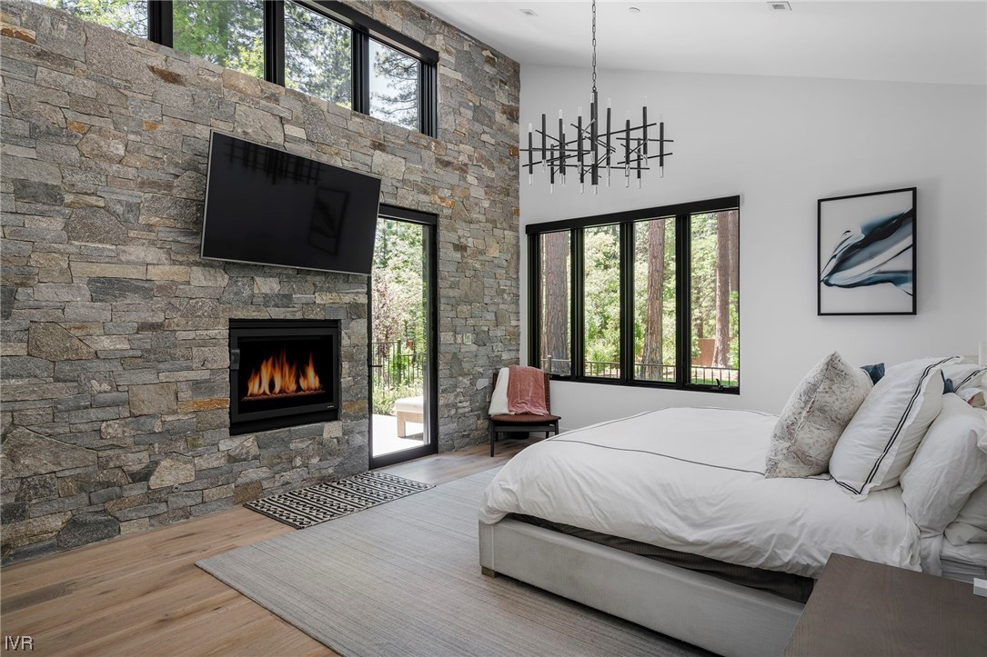 199 Tramway Road Incline Village, NV 89451 - Photo 6 of 49 a living room with furniture a fireplace and a flat screen tv