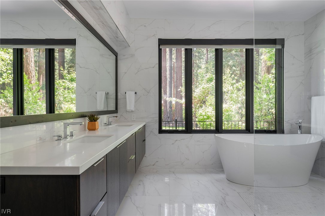 199 Tramway Road Incline Village, NV 89451 - Photo 7 of 49 a bathroom with a bathtub and 2 sink