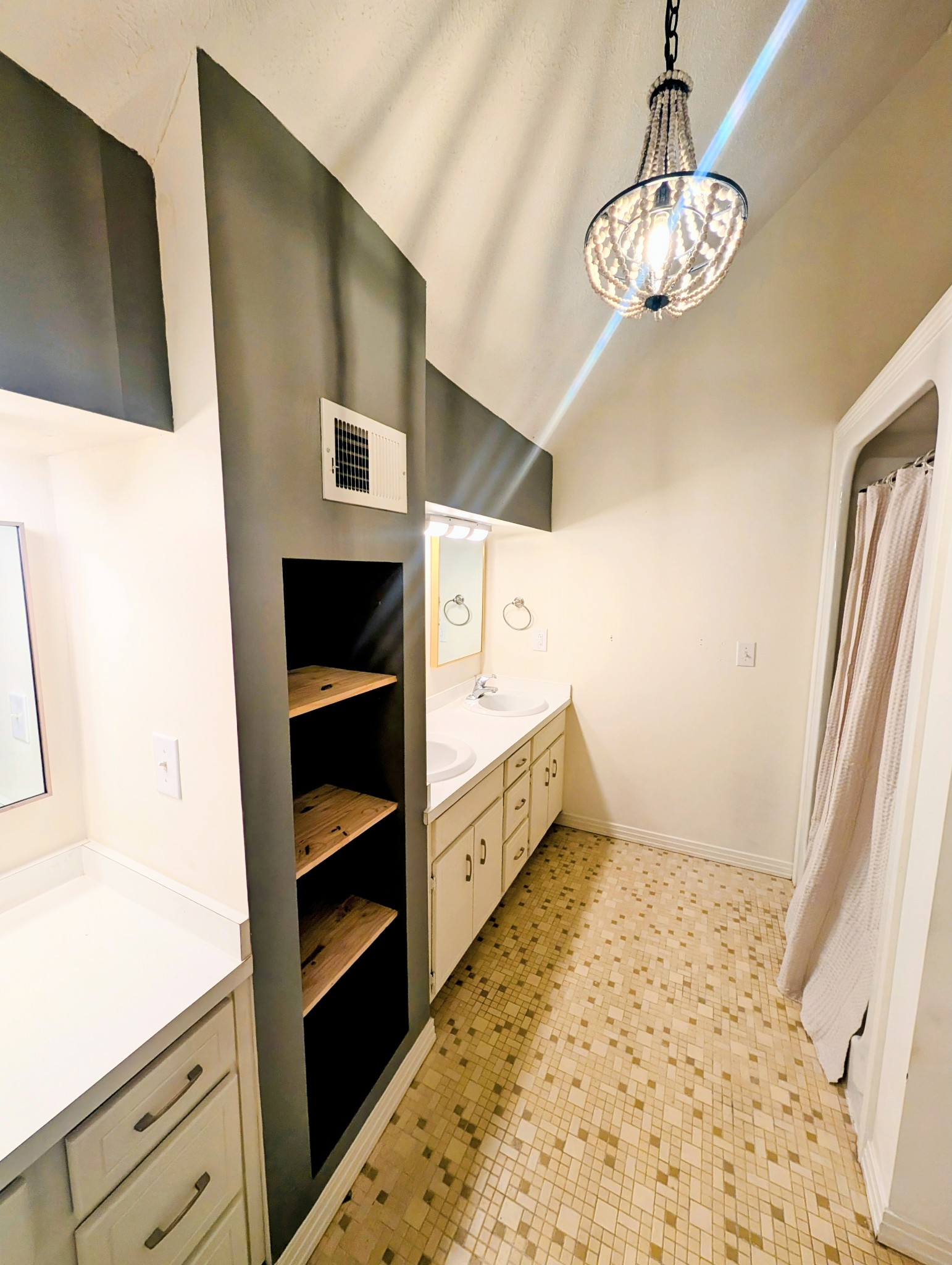 1080 Bybee Branch Road McMinnville, TN 37110 - Photo 19 of 36 a bathroom with a double vanity sink and a mirror
