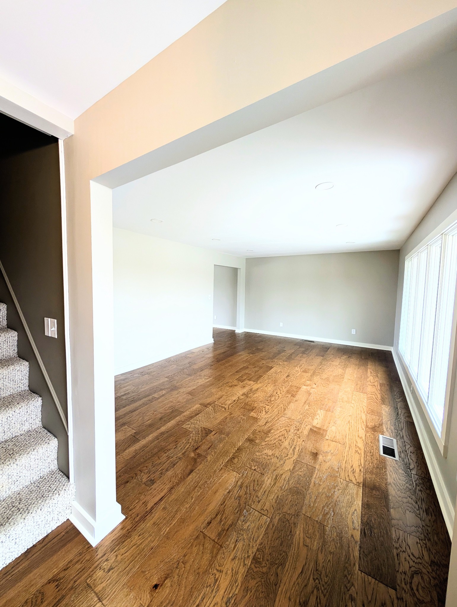 1080 Bybee Branch Road McMinnville, TN 37110 - Photo 4 of 36 wooden floor in an empty room with a window