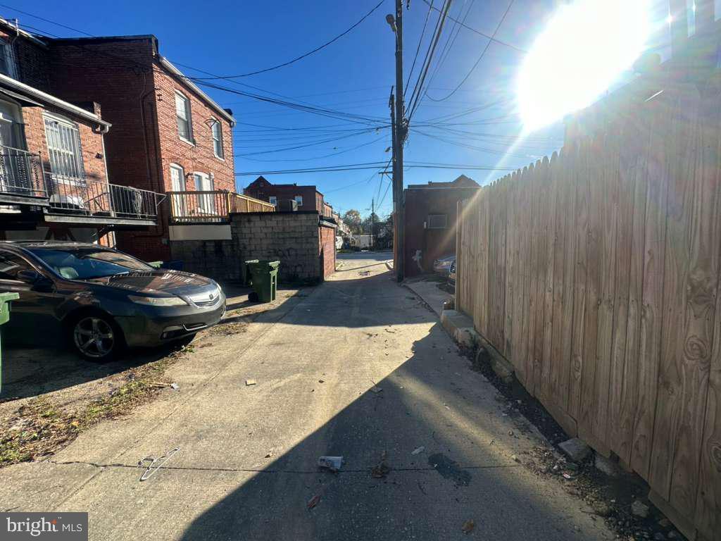 8 North Ellamont Street Baltimore, MD 21229 - Photo 14 of 16 a view of a back yard of the house