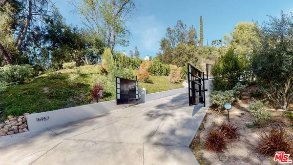 a view of an outdoor space and a yard