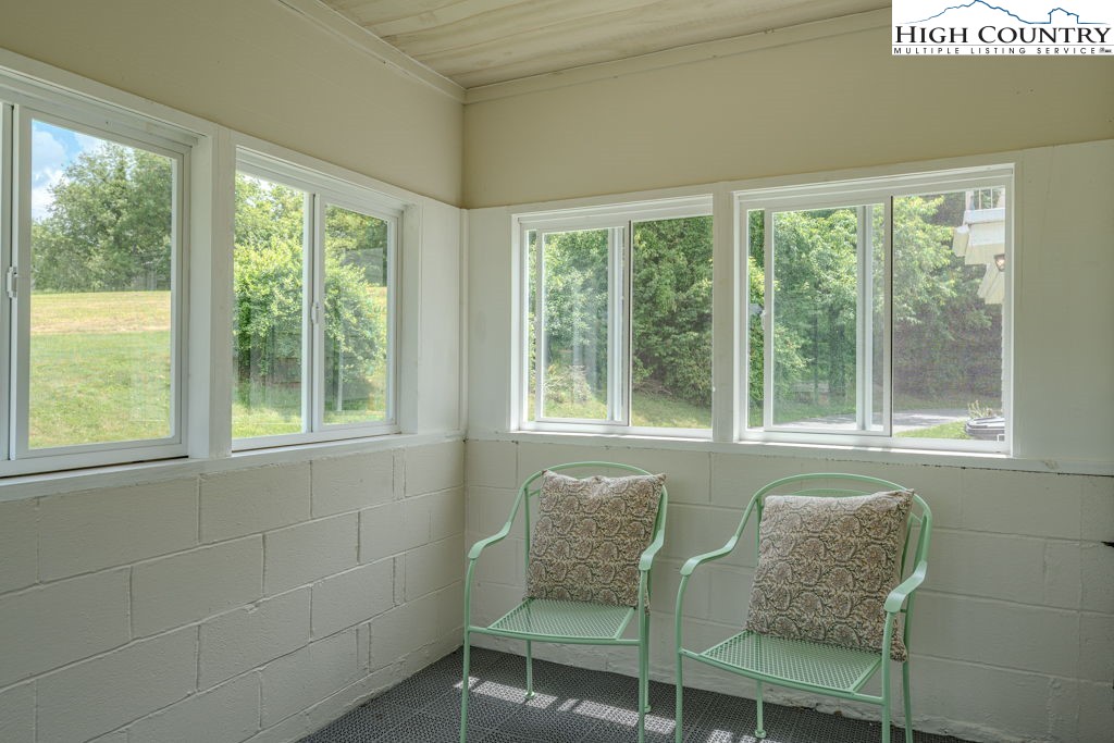 1821 Deerfield Road Boone, NC 28607 - Photo 12 of 33 a and dining room with furniture and windows