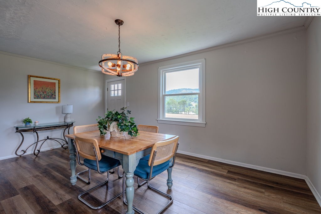 1821 Deerfield Road Boone, NC 28607 - Photo 18 of 33 a dining room with furniture and window