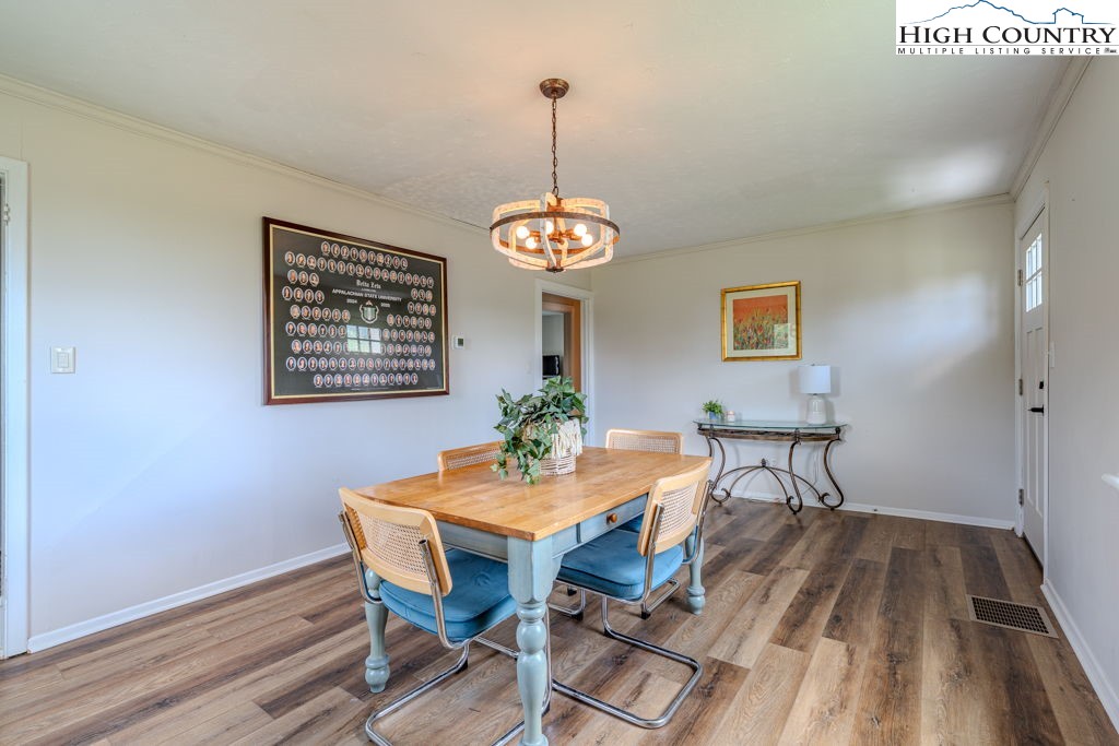 1821 Deerfield Road Boone, NC 28607 - Photo 19 of 33 a view of a dining room with a table and chairs