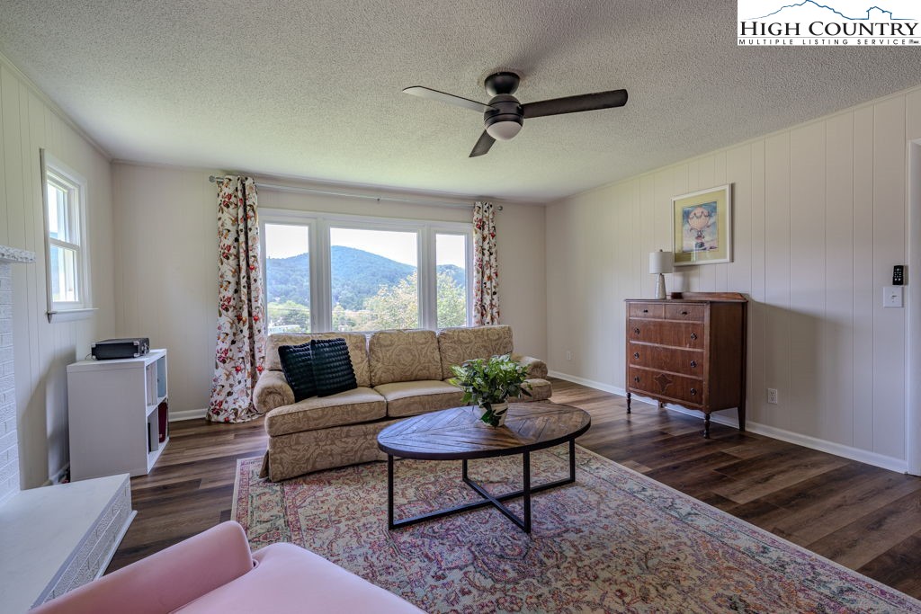 1821 Deerfield Road Boone, NC 28607 - Photo 25 of 33 a living room with furniture and a window