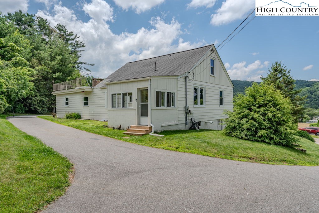 1821 Deerfield Road Boone, NC 28607 - Photo 3 of 33 a view of a house with a yard