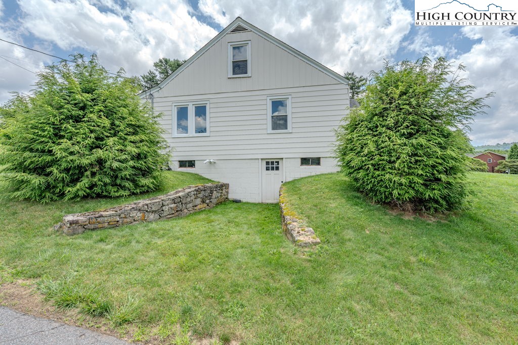 1821 Deerfield Road Boone, NC 28607 - Photo 4 of 33 a front view of house with garden