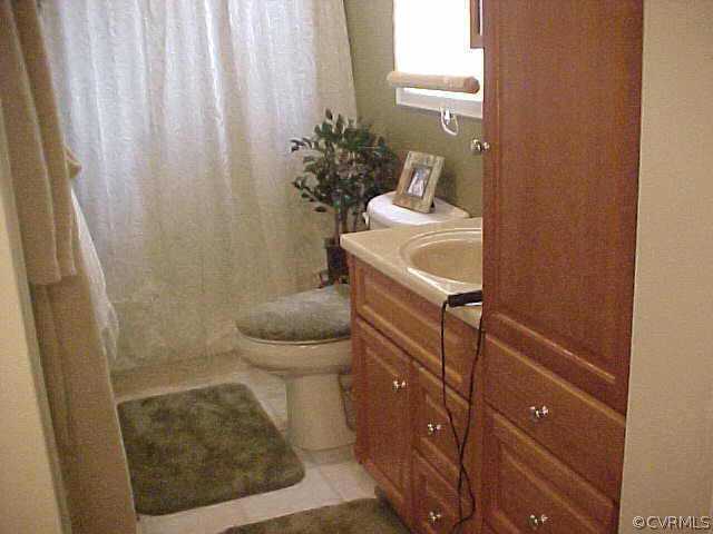 1223 Mt Pleasant Road Pamplin, VA 23958 - Photo 8 of 10 a bathroom with a sink and toilet