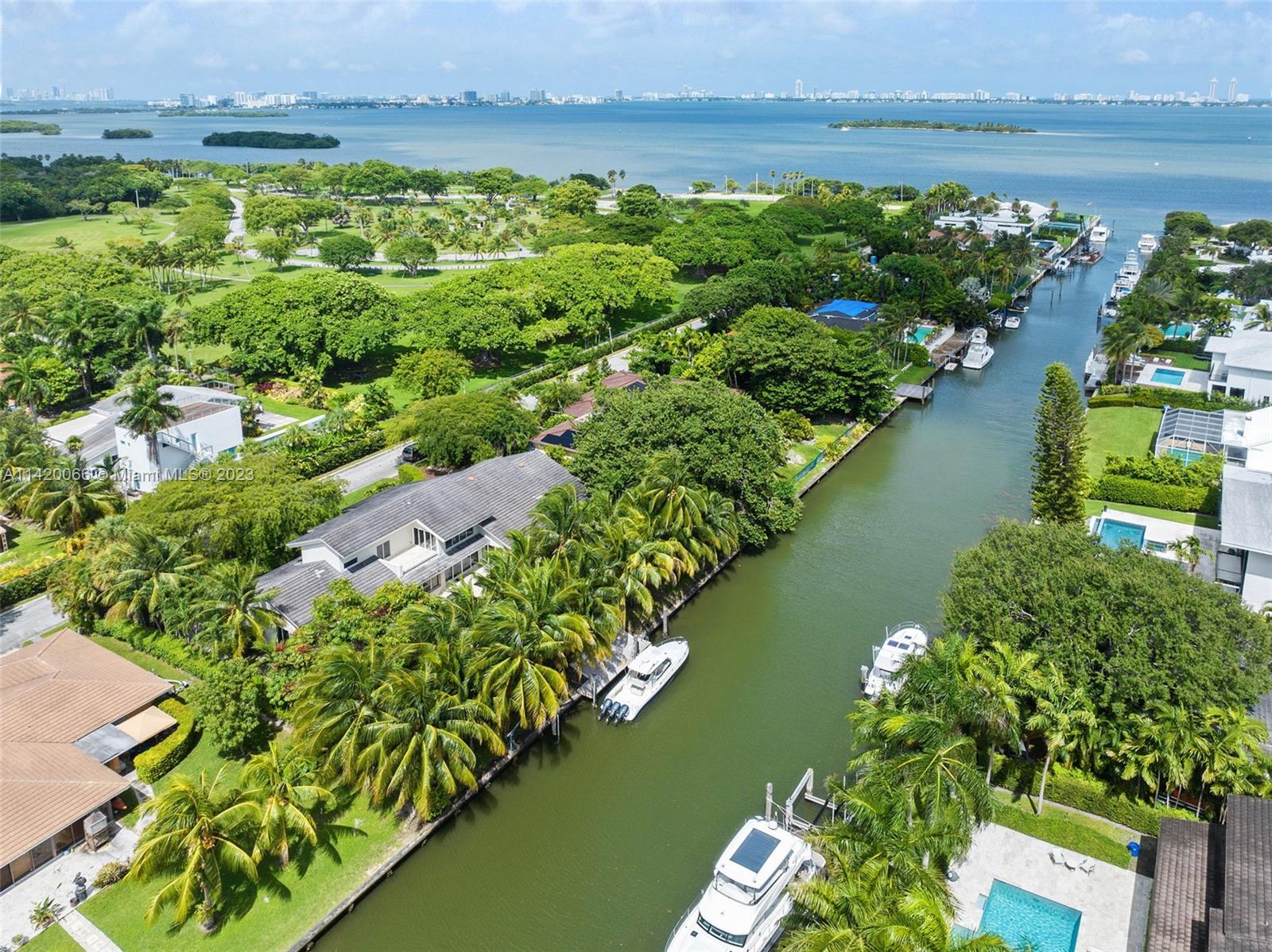 700 Lake Road Miami, FL 33137 - Photo 16 of 59 an aerial view of a houses with ocean view