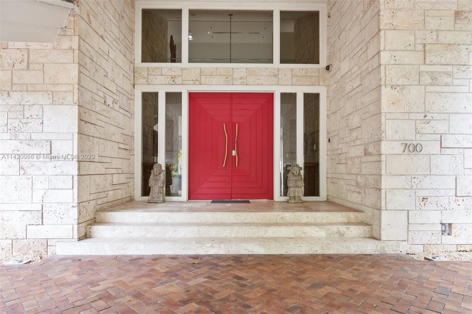700 Lake Road Miami, FL 33137 - Photo 2 of 59 a view of entryway with a brick walls