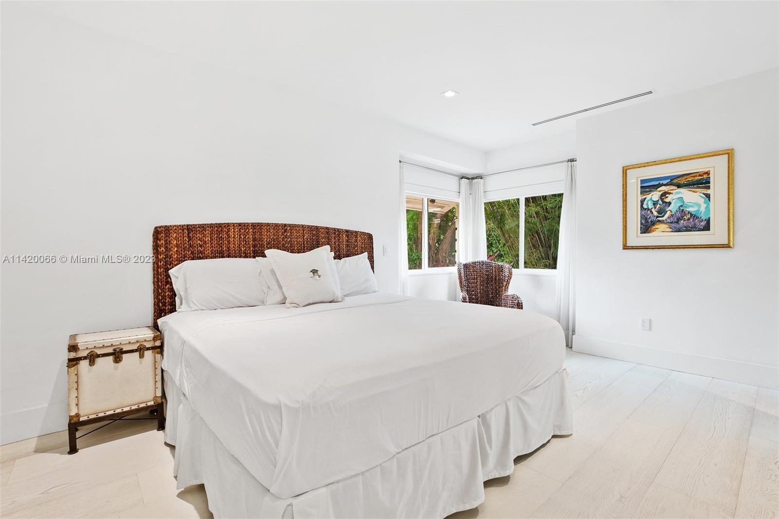 700 Lake Road Miami, FL 33137 - Photo 26 of 59 a bedroom with a bed and a couch