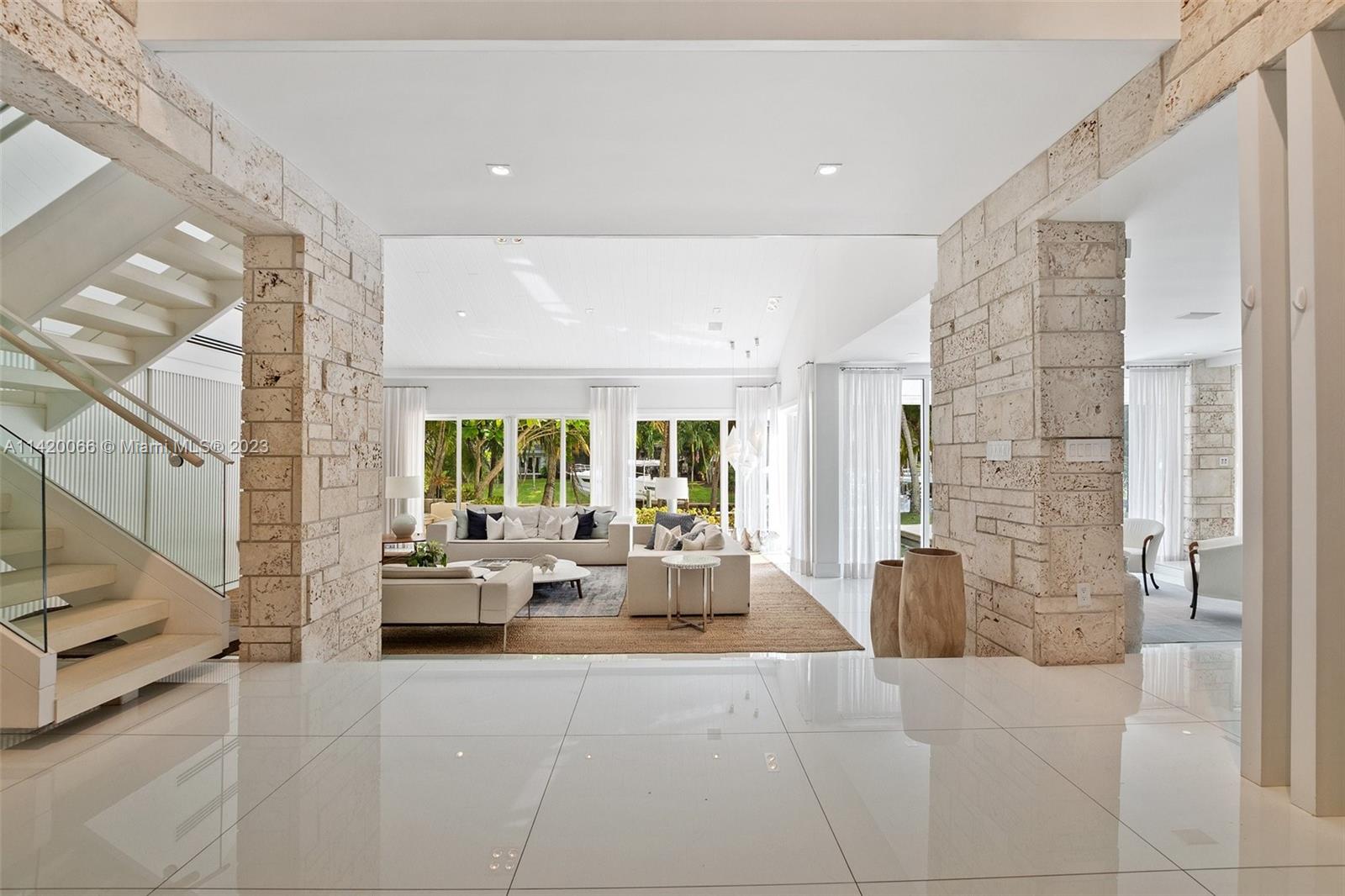 700 Lake Road Miami, FL 33137 - Photo 3 of 59 a living room with furniture and a large window