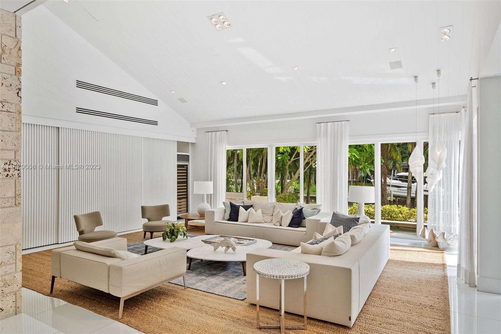 700 Lake Road Miami, FL 33137 - Photo 4 of 59 a living room with furniture and a large window