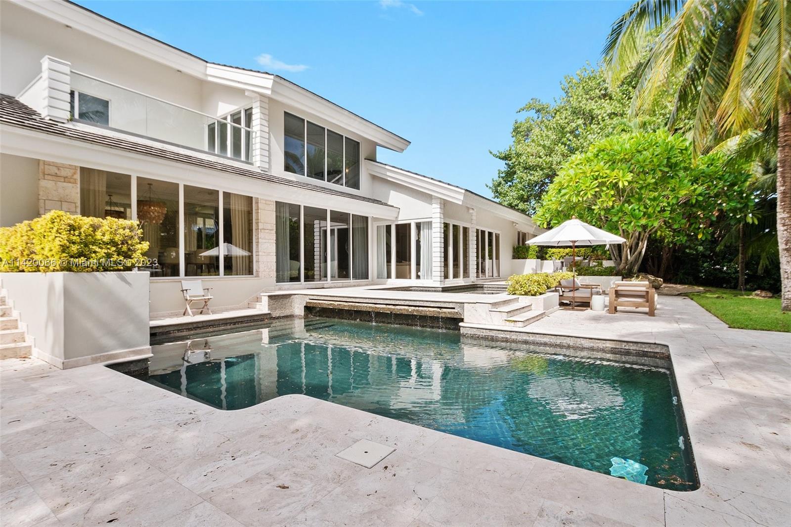 700 Lake Road Miami, FL 33137 - Photo 41 of 59 a front view of a house with swimming pool