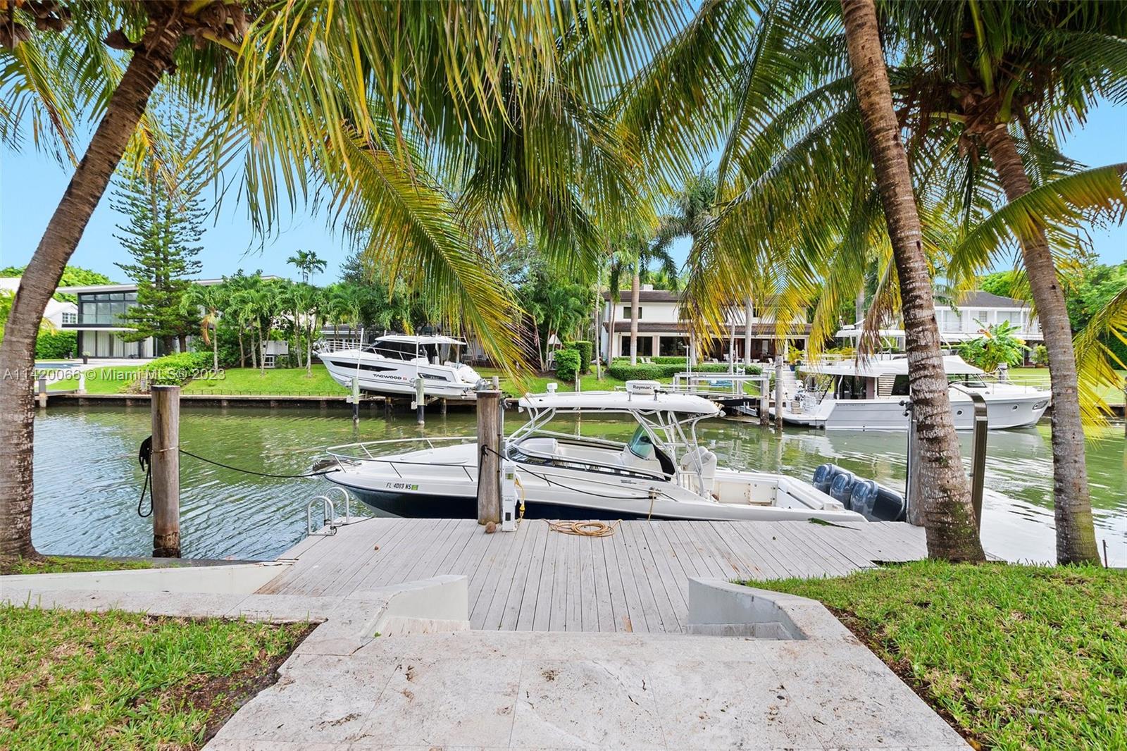 700 Lake Road Miami, FL 33137 - Photo 46 of 59 a view of a swimming pool with a patio
