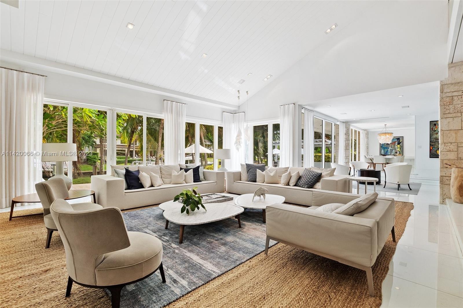 700 Lake Road Miami, FL 33137 - Photo 6 of 59 a living room with furniture and a large window