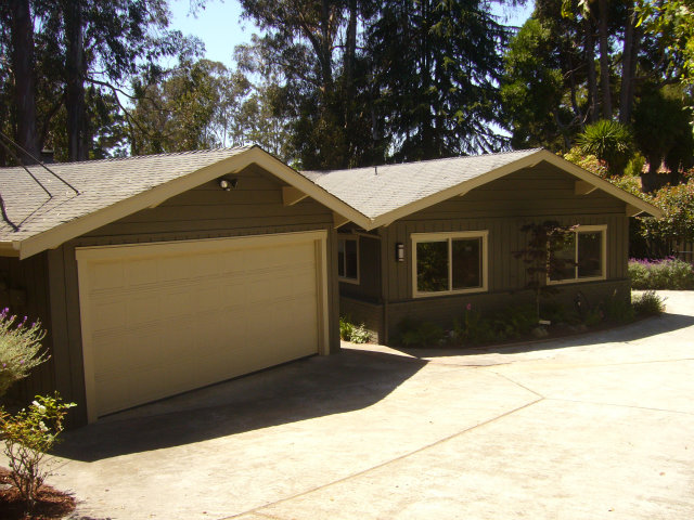 414 Locke Drive Aptos, CA 95003 - Photo 2 of 11 a front view of a house with a yard