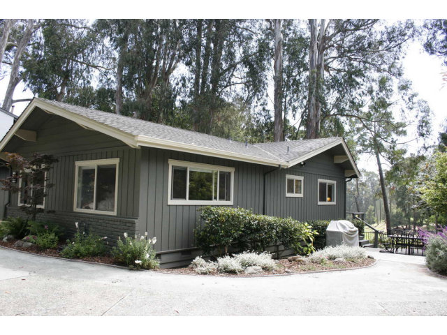 414 Locke Drive Aptos, CA 95003 - Photo 4 of 11 a front view of a house with a yard
