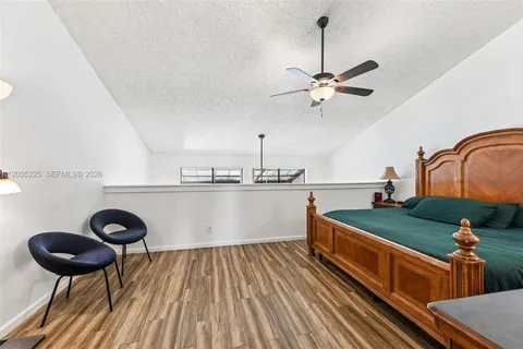 a kitchen with a table and chairs