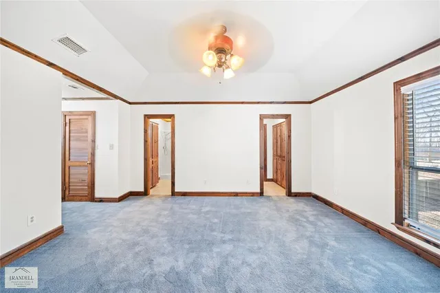 a building with trees in front of it