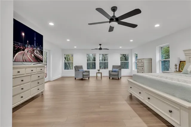 a bathroom with a bathtub and window