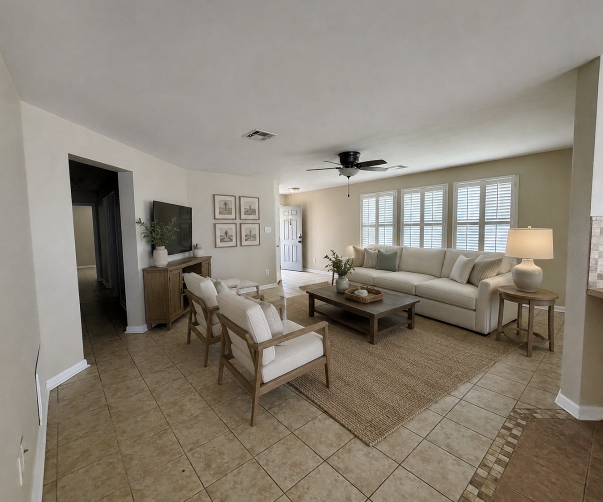 1148 Amberwood Loop Kyle, TX 78640 - Photo 4 of 20 a living room with furniture and a large window