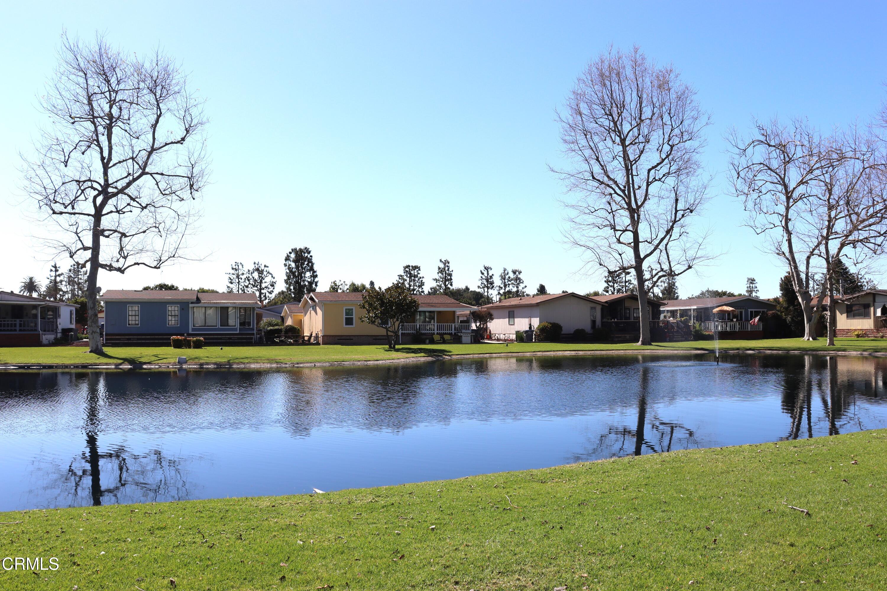 440 Dewberry Lane, Unit 105 Oxnard, CA 93036 - Photo 30 of 75 a view of a lake with houses