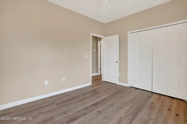 a bathroom with a sink vanity and a mirror