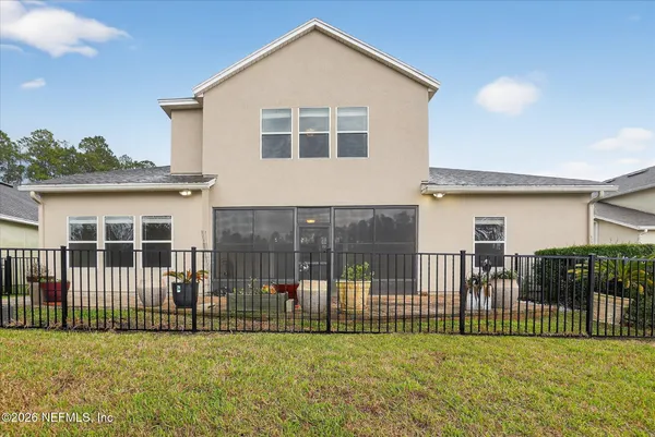 a view of a backyard with plants