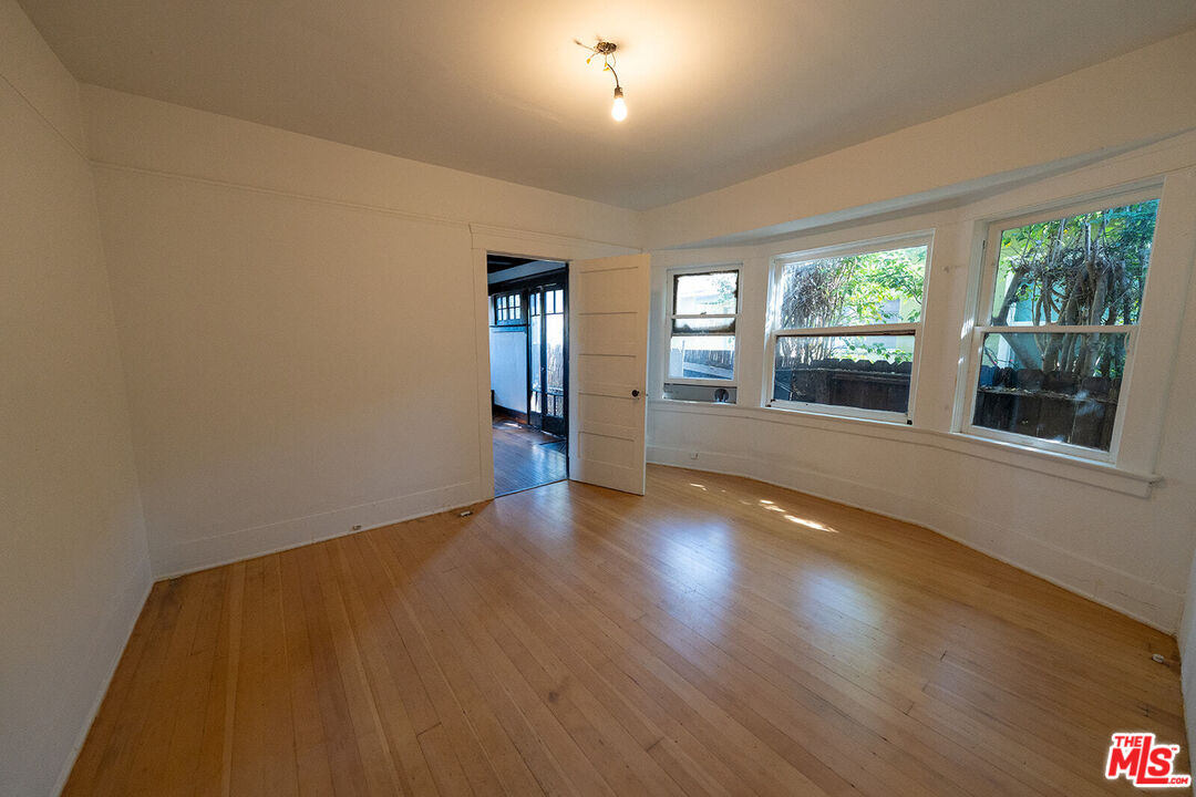 1801 Shell Avenue Venice, CA 90291 - Photo 5 of 12 a view of empty room with wooden floor and fan