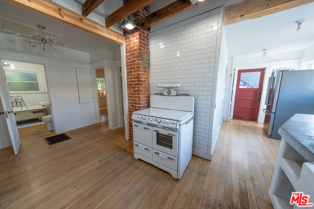 1801 Shell Avenue Venice, CA 90291 - Photo 8 of 12 a kitchen with sink and refrigerator