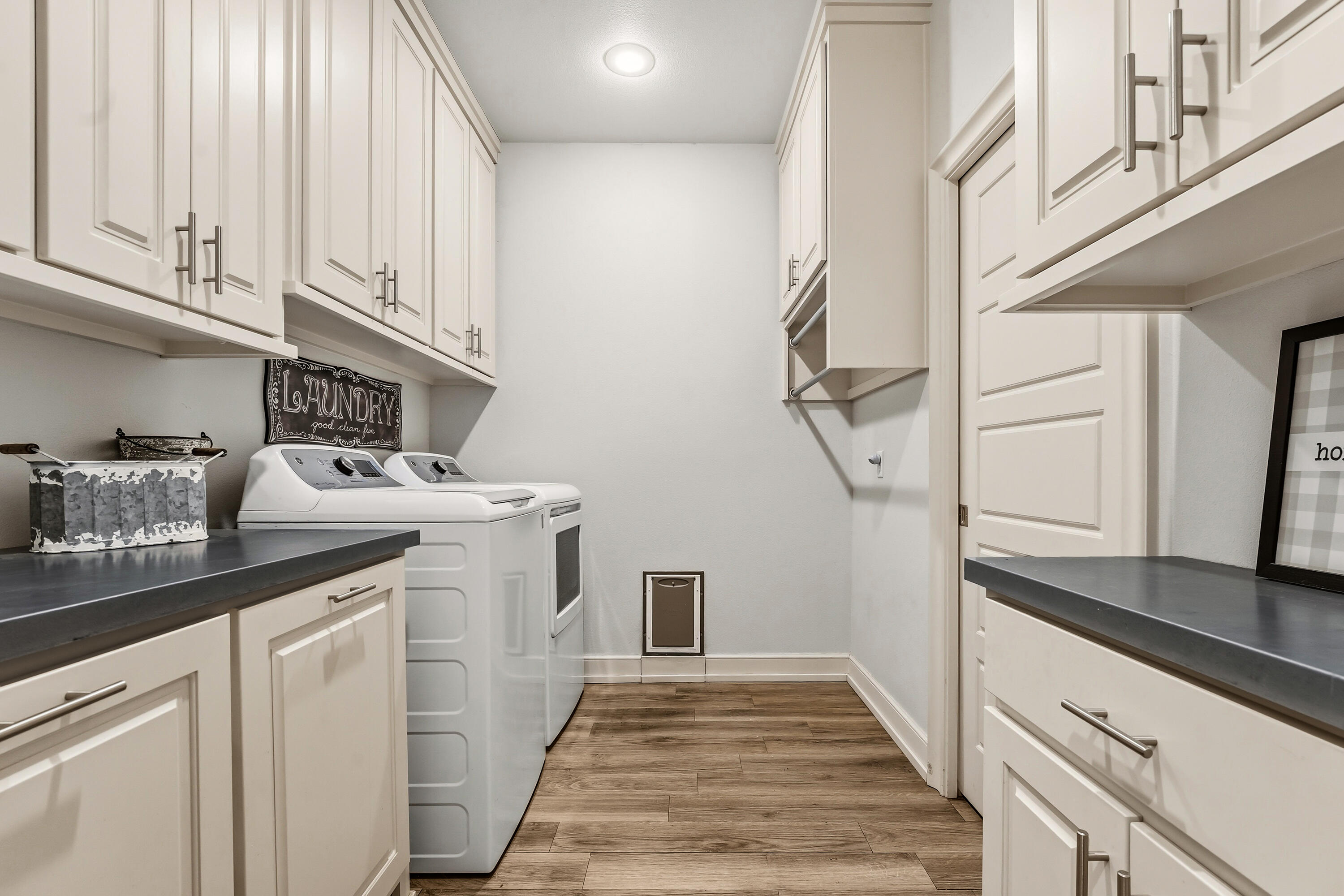 1113 16th Street Shallowater, TX 79363 - Photo 26 of 33 a kitchen with a sink and cabinets