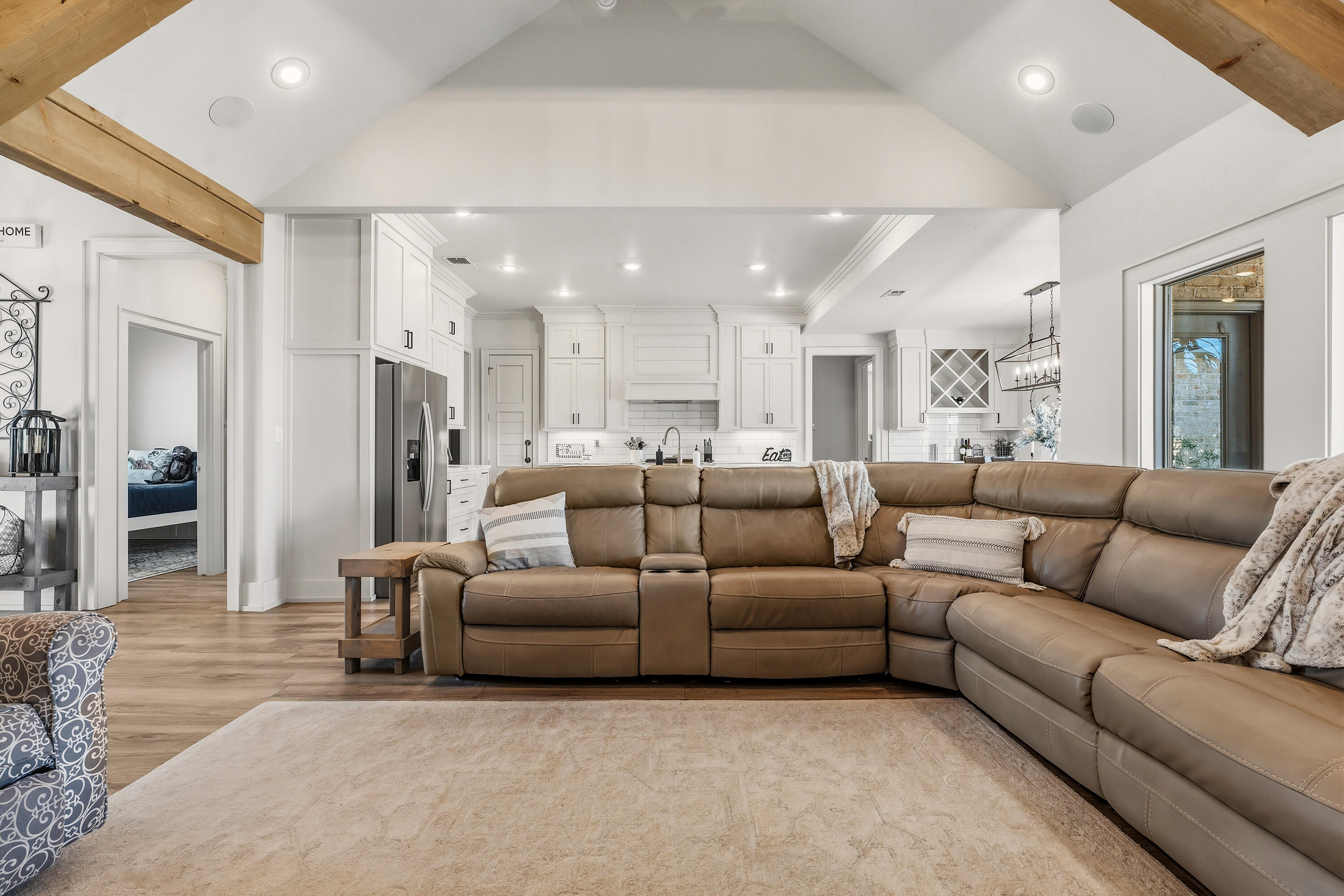 1113 16th Street Shallowater, TX 79363 - Photo 6 of 33 a living room with furniture and a wooden floor