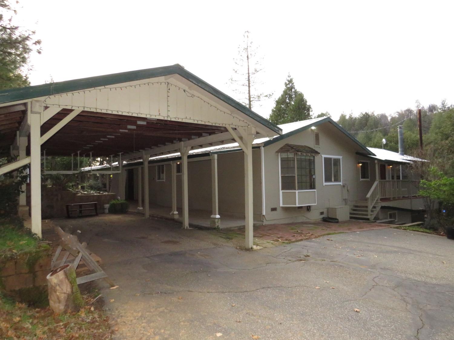 23730 Milk Ranch Road Colfax, CA 95713 - Photo 1 of 1 Country charmer with RV carport on 4.68 Acres.