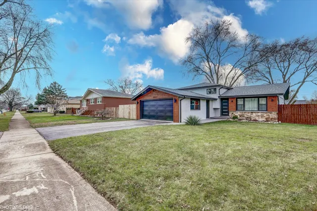a picture of a bench in front of a wall