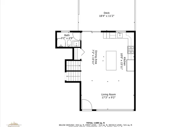 a picture of a bench in front of a building