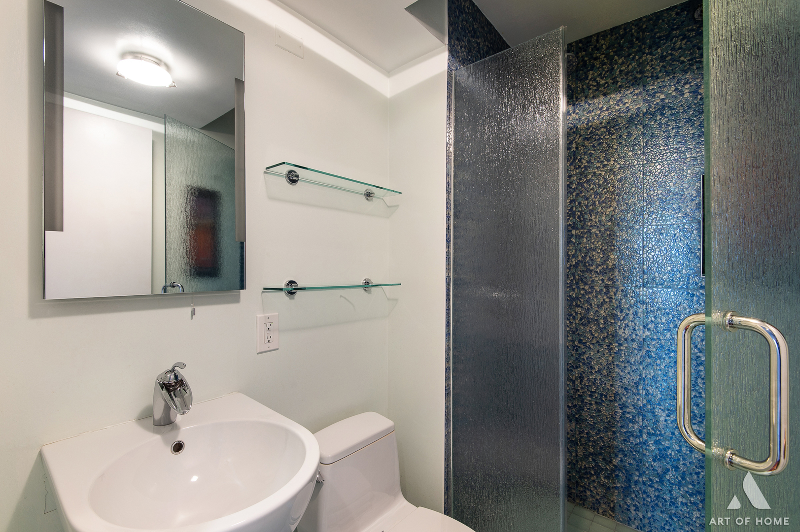 400 East Ohio Street, Unit 2902 Chicago, IL 60611 - Photo 13 of 33 a bathroom with a sink a toilet and shower