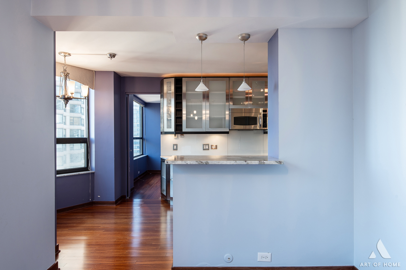 400 East Ohio Street, Unit 2902 Chicago, IL 60611 - Photo 8 of 33 a view of hallway with furniture and wooden floor