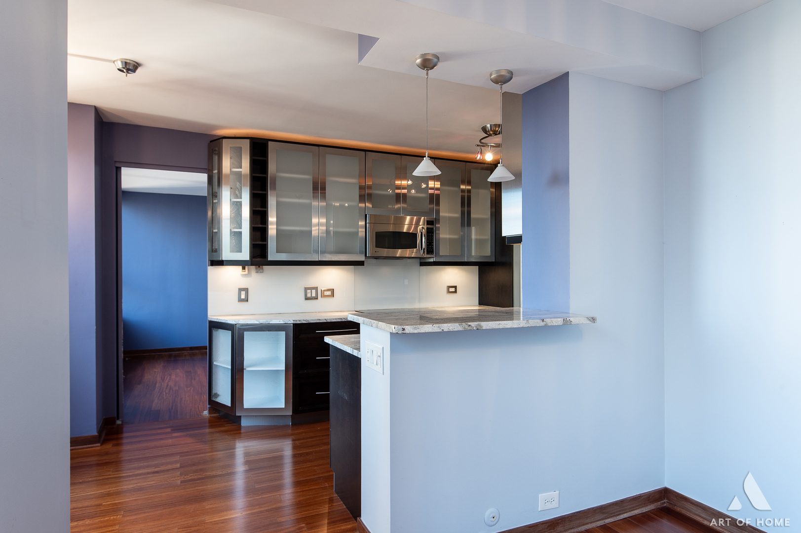 400 East Ohio Street, Unit 2902 Chicago, IL 60611 - Photo 9 of 33 a kitchen with stainless steel appliances a sink and cabinets
